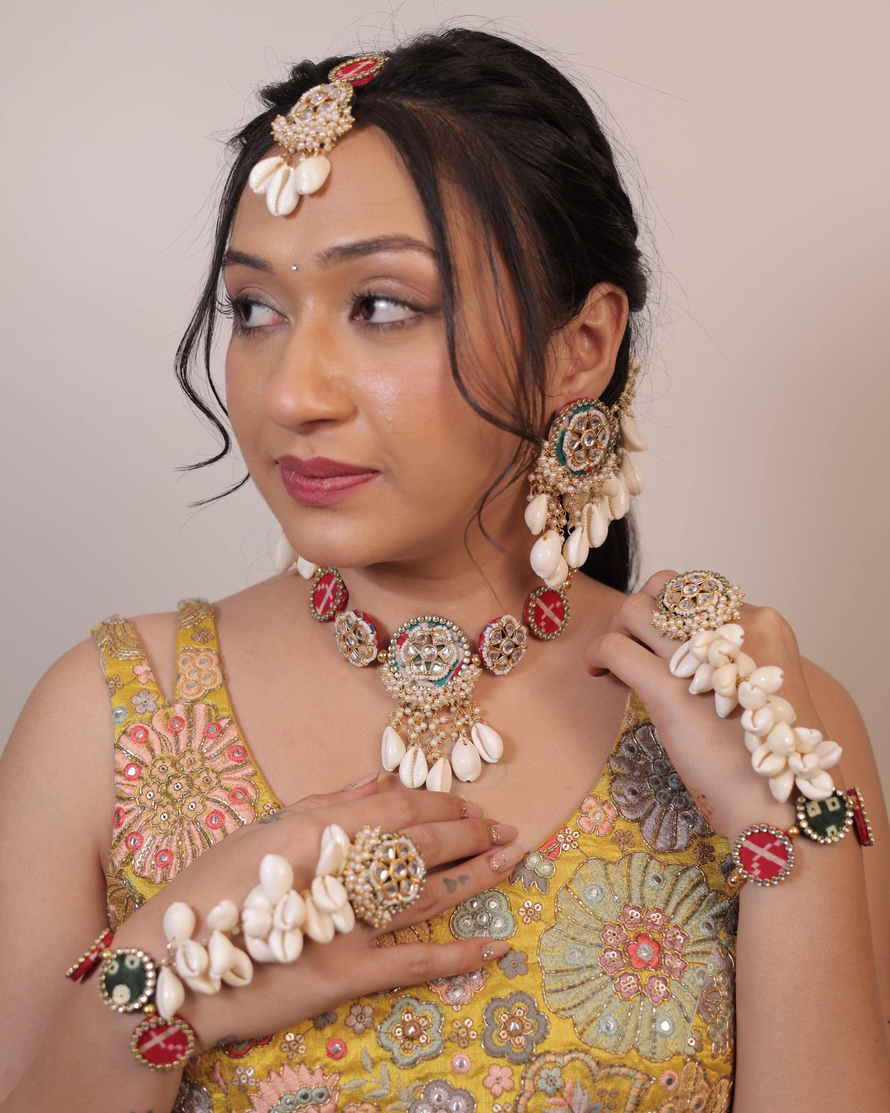 Rohini set (Marron Patola with Bottal green bandhej)